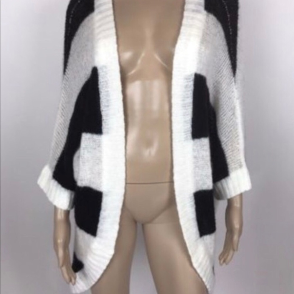 Black and white Sweater Shrug from Torrid